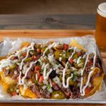Nachos and beer from Nueces Brewing Co.